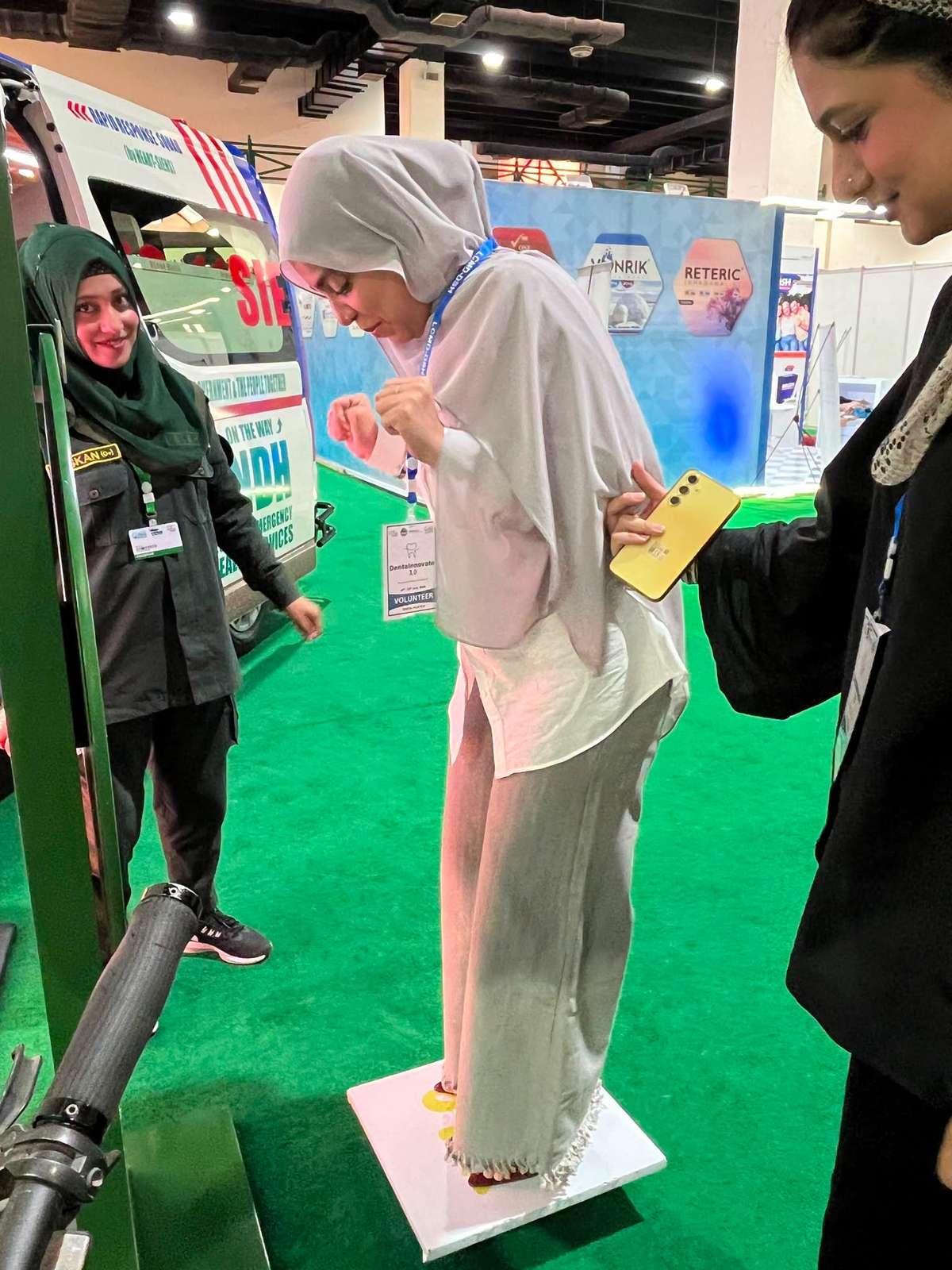 Visitor testing coordination on the Balance Board challenge at the SIEHS Health Asia 2026 Experience Zone