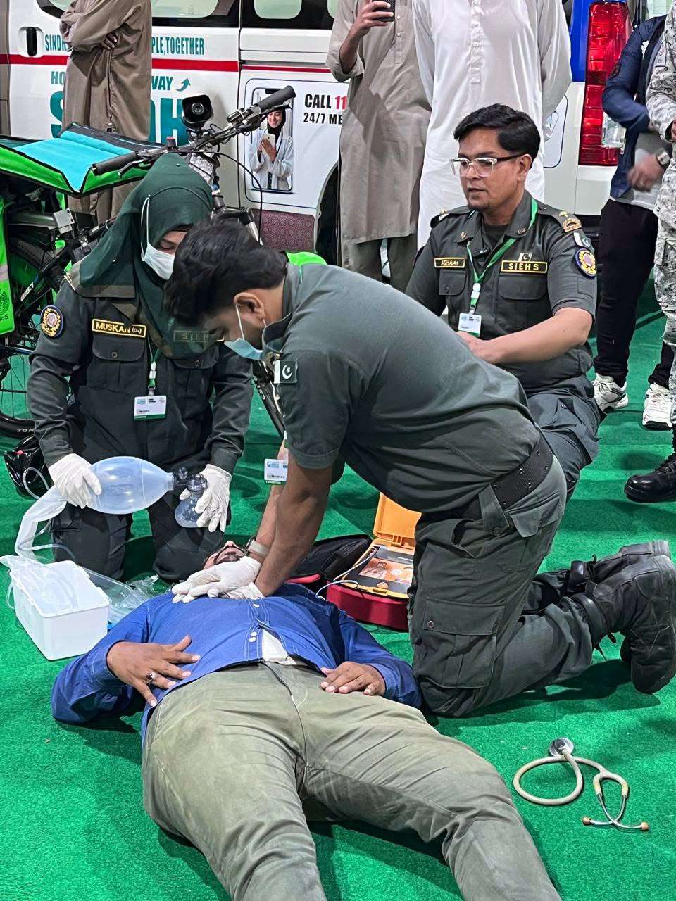SIEHS team performing a live CPR and oxygen demonstration at the Health Asia 2026 booth