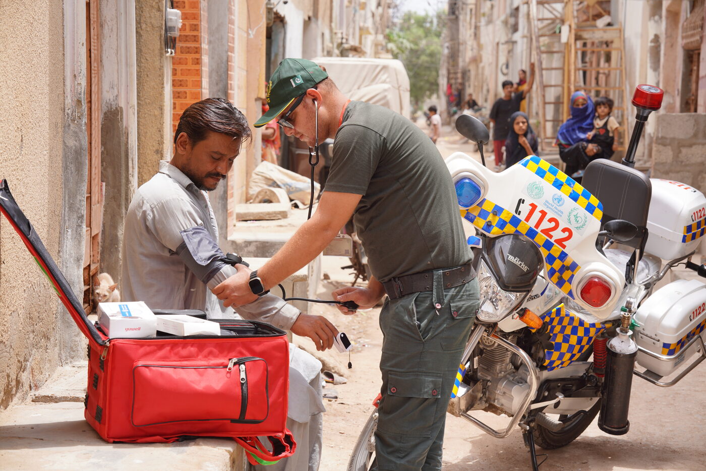 SIEHS 1122 paramedic checking blood pressure during a community emergency response call